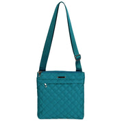 Teal quilted shoulder bag on a white background