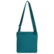 Teal quilted crossbody bag on a white background